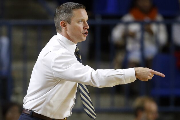 Florida head coach Mike White directs his players in the first half of a Veterans Classic NCAA college basketball game against Navy, Friday, Nov. 13, 2015, in Annapolis, Md. (AP Photo/Patrick Semansky) Florida head coach Mike White directs his players in the first half of a Veterans Classic NCAA college basketball game against Navy, Friday, Nov. 13, 2015, in Annapolis, Md. (AP Photo/Patrick Semansky)