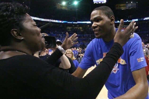 Oklahoma City Thunder forward Kevin Durant, right, greets his mother, Wanda Pratt, left, following Game 7 of a second-round NBA basketball playoff series against the Memphis Grizzlies in Oklahoma City, Sunday, May 15, 2011. Oklahoma City won 105-90. (AP Photo/Sue Ogrocki)