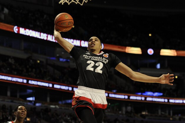 East forward Jayson Tatum, from Chaminade  in St. Louis, Mo. dunks against the West team during the McDonald's All-American boys basketball game, Wednesday, March 30, 2016, in Chicago. The West beat the East  114-107. (AP Photo/Matt Marton)