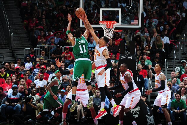 ATLANTA, GA - APRIL 19:  Evan Turner #11 of the Boston Celtics shoots against Thabo Sefolosha #25 of the Atlanta Hawks in Game Two of the Eastern Conference Quarterfinals during the 2016 NBA Playoffs on April 19, 2016 at Philips Arena in Atlanta, Georgia.  NOTE TO USER: User expressly acknowledges and agrees that, by downloading and/or using this Photograph, user is consenting to the terms and conditions of the Getty Images License Agreement. Mandatory Copyright Notice: Copyright 2016 NBAE (Photo by Scott Cunningham/NBAE via Getty Images)