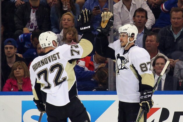 NEW YORK, NY - APRIL 19: Sidney Crosby #87 of the Pittsburgh Penguins celebrates his powerplay goal at 19:18 of the second period against the New York Rangers and is joined by Patric Hornqvist #72  in Game Three of the Eastern Conference First Round during the 2016 NHL Stanley Cup Playoffs at at Madison Square Garden on April 19, 2016 in New York City.  (Photo by Bruce Bennett/Getty Images)