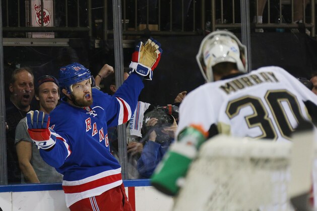 NEW YORK, NY - APRIL 19:  Rick Nash #61 of the New York Rangers celebrates his shorthanded goal at 39 seconds of the second period against Matt Murray #30 of the Pittsburgh Penguins in Game Three of the Eastern Conference First Round during the 2016 NHL Stanley Cup Playoffs at at Madison Square Garden on April 19, 2016 in New York City. The Penguins defeated the Rangers 3-1.  (Photo by Bruce Bennett/Getty Images)