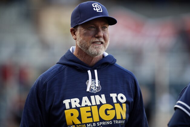 San Diego Padres bench coach Mark McGwire smiles before the start of an exhibition baseball game against El Paso Chihuahuas in El Paso, Texas, Thursday, March 31, 2016. (AP Photo/Andres Leighton)