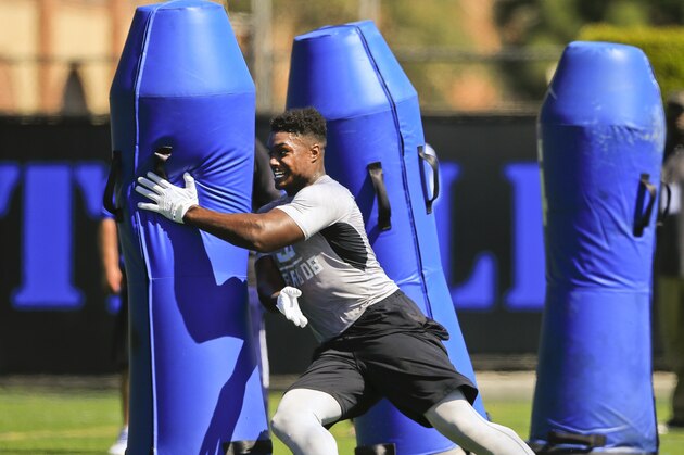 UCLA linebacker Myles Jack runs drills during NFL football pro day in Los Angeles on Tuesday, March 15, 2016. (AP Photo/Damian Dovarganes)