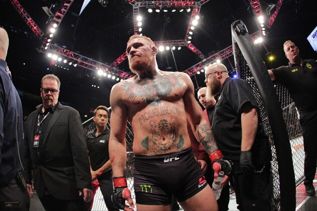 LAS VEGAS, NV - MARCH 5:  Conor McGregor exits the Octagon after his fight against Nate Diaz in their welterweight bout during the UFC 196 at the MGM Grand Garden Arena on March 5, 2016 in Las Vegas, Nevada. (Photo by Rey Del Rio/Getty Images)