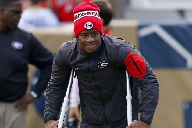 Georgia running back Nick Chubb on crutches before a game of an NCAA college football game Saturday, Nov. 28, 2015, in Atlanta. (AP Photo/Brett Davis)