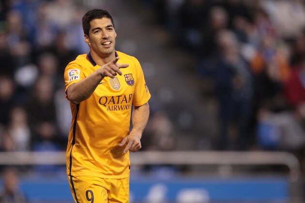 Barcelona's Luis Suarez celebrates after scoring a goal during a Spanish La Liga soccer match between Deportivo Coruna and Barcelona at the Riazor stadium in A Coruna, Spain, Wednesday, April 20, 2016. (AP Photo/Lalo R. Villar)