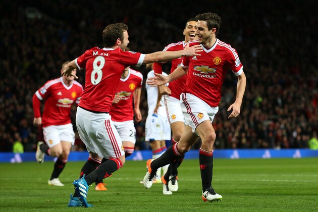 MANCHESTER, ENGLAND - APRIL 20:  Matteo Darmian of Manchester United celebrates with team mates after scoring his sides second goal during the Barclays Premier League match between Manchester United and Crystal Palace at Old Trafford on April 20, 2016 in Manchester, England.  (Photo by Alex Livesey/Getty Images)