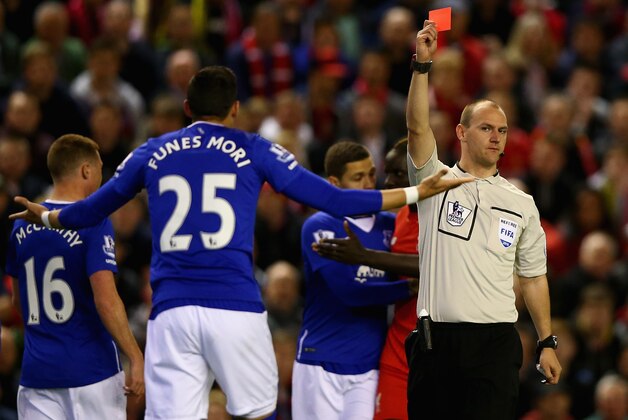 LIVERPOOL, ENGLAND - APRIL 20:  Ramiro Funes Mori of Everton recieves a red card during the Barclays Premier League match between Liverpool and Everton at Anfield, April 20, 2016, Liverpool, England  (Photo by Clive Brunskill/Getty Images)