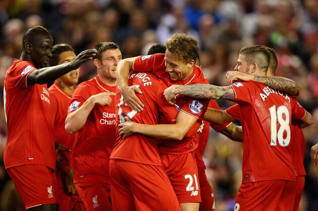 LIVERPOOL, ENGLAND - APRIL 20:  Daniel Sturridge of Liverpool celebrates  with Lucas Leiva of Liverpool after scoring his sides third goal during the Barclays Premier League match between Liverpool and Everton at Anfield, April 20, 2016, Liverpool, England  (Photo by Clive Brunskill/Getty Images)