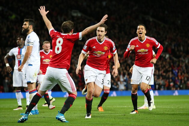 MANCHESTER, ENGLAND - APRIL 20:  Matteo Darmian of Manchester United celebrates with team mates after scoring his sides second goal during the Barclays Premier League match between Manchester United and Crystal Palace at Old Trafford on April 20, 2016 in Manchester, England.  (Photo by Alex Livesey/Getty Images)
