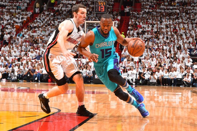 MIAMI,FL - APRIL 17: Kemba Walker #15 of the Charlotte Hornets drives to the basket against the Miami Heat during the Eastern Conference playoffs First Round Game One on April 17, 2016 at the American Airlines Arena in Miami, Florida. NOTE TO USER: User expressly acknowledges and agrees that, by downloading and/or using this Photograph, user is consenting to the terms and conditions of the Getty Images License Agreement. Mandatory Copyright Notice: Copyright 2016 NBAE (Photo by Jesse D. Garrabrant/NBAE via Getty Images)
