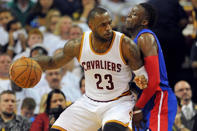Apr 17, 2016; Cleveland, OH, USA; Cleveland Cavaliers forward LeBron James (23) works against Detroit Pistons guard Reggie Jackson (1) during the second quarter in game one of the first round of the NBA Playoffs at Quicken Loans Arena. Mandatory Credit: Ken Blaze-USA TODAY Sports