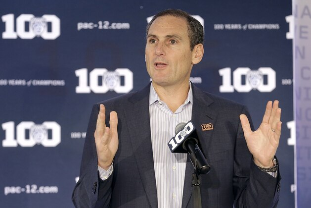Pac-12 commissioner Larry Scott speaks during NCAA college basketball Pac-12 media day in San Francisco, Thursday, Oct. 15, 2015. (AP Photo/Jeff Chiu)
