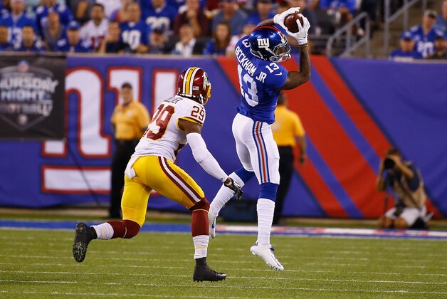 EAST RUTHERFORD, NJ - SEPTEMBER 24:  Odell Beckham #13 of the New York Giants makes a catch against  Chris Culliver #29 of the Washington Redskins  during their game at MetLife Stadium on September 24, 2015 in East Rutherford, New Jersey.  (Photo by Al Bello/Getty Images)