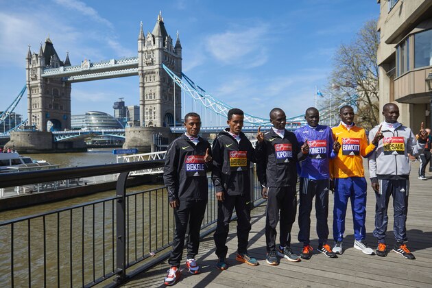 Marathon runners (L-R) Ethiopia's Kenenisa Bekele, Eritrea's Ghirmay Ghebreslassie, Kenya's Eliud Kipchoge, Kenya's Dennis Kimetto, Kenya's Stanley Biwott and Kenya's Wilson Kipsang pose for photographers near Tower Bridge in central London on April 20, 2016 during a photo call ahead of the London marathon.
The 2016 London Marathon is set to take place on April 24, 2016. / AFP / NIKLAS HALLE'N        (Photo credit should read NIKLAS HALLE'N/AFP/Getty Images)