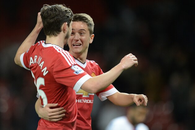 Manchester United's Italian defender Matteo Darmian (L) and Manchester United's Spanish midfielder Ander Herrera celebrate after winning the English Premier League football match between Manchester United and Crystal Palace at Old Trafford in Manchester, north west England, on April 20, 2016. / AFP / OLI SCARFF / RESTRICTED TO EDITORIAL USE. No use with unauthorized audio, video, data, fixture lists, club/league logos or 'live' services. Online in-match use limited to 75 images, no video emulation. No use in betting, games or single club/league/player publications. / (Photo credit should read OLI SCARFF/AFP/Getty Images) Manchester United's Italian defender Matteo Darmian (L) and Manchester United's Spanish midfielder Ander Herrera celebrate after winning the English Premier League football match between Manchester United and Crystal Palace at Old Trafford in Manchester, north west England, on April 20, 2016. / AFP / OLI SCARFF / RESTRICTED TO EDITORIAL USE. No use with unauthorized audio, video, data, fixture lists, club/league logos or 'live' services. Online in-match use limited to 75 images, no video emulation. No use in betting, games or single club/league/player publications. / (Photo credit should read OLI SCARFF/AFP/Getty Images)