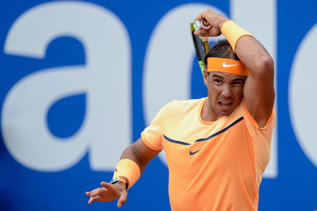 Spain's Rafael Nadal returns the ball to Spain's Albert Montanes during the ATP Barcelona Open 'Conde de Godo' tennis tournament in Barcelona on April 21, 2016.  / AFP / JOSEP LAGO        (Photo credit should read JOSEP LAGO/AFP/Getty Images)
