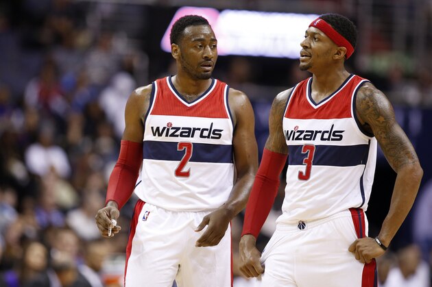 Washington Wizards guards John Wall (2) and Bradley Beal (3) talk in the second half of an NBA basketball game against the San Antonio Spurs, Wednesday, Nov. 4, 2015, in Washington. The Wizards won 102-99. (AP Photo/Alex Brandon) Washington Wizards guards John Wall (2) and Bradley Beal (3) talk in the second half of an NBA basketball game against the San Antonio Spurs, Wednesday, Nov. 4, 2015, in Washington. The Wizards won 102-99. (AP Photo/Alex Brandon)
