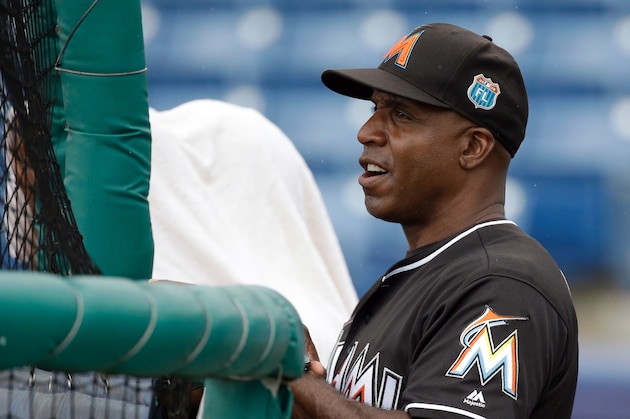 Miami Marlins coach Barry Bonds watches batting practice before a spring training baseball game against the Washington Nationals, Monday, March 28, 2016, in Viera, Fla. (AP Photo/John Raoux)