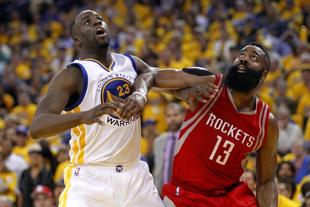 Apr 18, 2016; Oakland, CA, USA; Golden State Warriors forward Draymond Green (23) battles for position with Houston Rockets guard James Harden (13) in the fourth quarter in game two of the first round of the NBA Playoffs at Oracle Arena. The Warriors defeated the Rockets 115-106. Mandatory Credit: Cary Edmondson-USA TODAY Sports