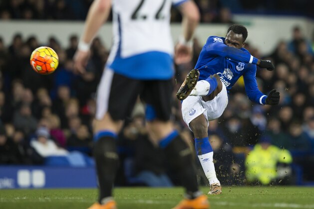 Everton's Romelu Lukaku, right, takes a free kick during the English Premier League soccer match between Everton and Newcastle at Goodison Park Stadium, Liverpool, England, Wednesday Feb. 3, 2016. (AP Photo/Jon Super)