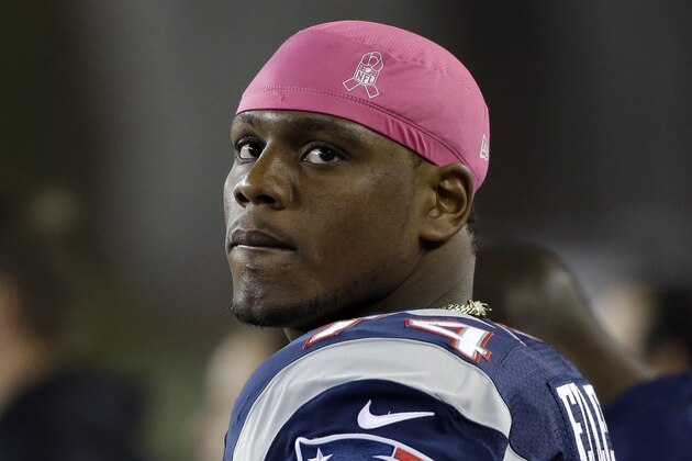 New England Patriots defensive tackle Dominique Easley wears a pink head covering, to acknowledge Breast Cancer Awareness Month, before an NFL football game against the Cincinnati Bengals Sunday, Oct. 5, 2014, in Foxborough, Mass. (AP Photo/Steven Senne)