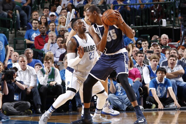 DALLAS, TX - APRIL 21: Wesley Matthews #23 of the Dallas Mavericks defends against Kevin Durant #35 of the Oklahoma City Thunder in Game Three of the Western Conference Quarterfinals of the 2016 NBA Playoffs on April 21, 2016 at the American Airlines Center in Dallas, Texas. NOTE TO USER: User expressly acknowledges and agrees that, by downloading and or using this photograph, User is consenting to the terms and conditions of the Getty Images License Agreement. Mandatory Copyright Notice: Copyright 2016 NBAE (Photo by Glenn James/NBAE via Getty Images)