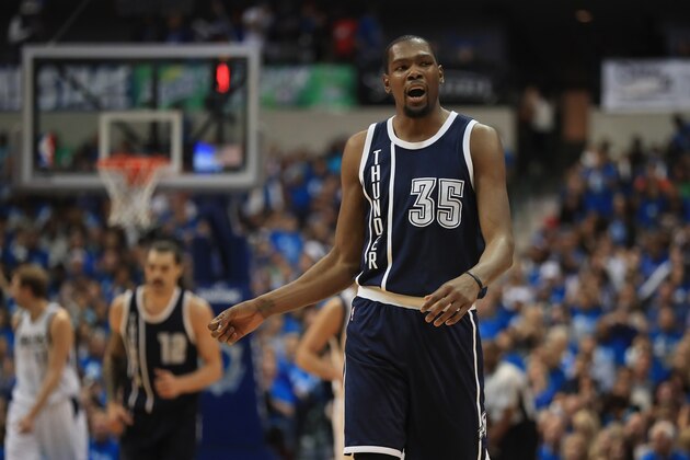 DALLAS, TX - APRIL 21:  Kevin Durant #35 of the Oklahoma City Thunder reacts after making a shot against the Dallas Mavericks during game three of the Western Conference Quarterfinals of the 2016 NBA Playoffs at American Airlines Center on April 21, 2016 in Dallas, Texas.  NOTE TO USER: User expressly acknowledges and agrees that, by downloading and or using this photograph, User is consenting to the terms and conditions of the Getty Images License Agreement.  (Photo by Ronald Martinez/Getty Images)