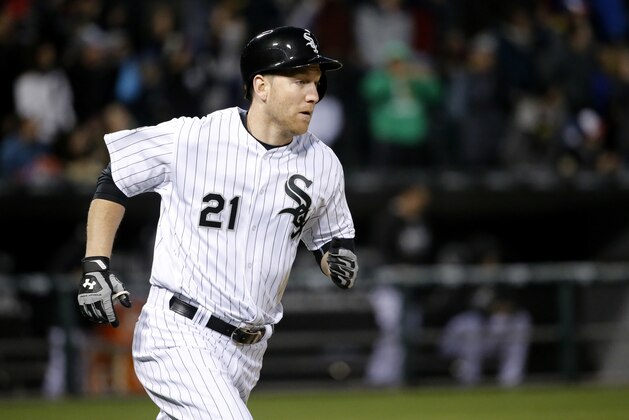 Chicago White Sox's Todd Frazier rounds the bases after hitting a home run off Los Angeles Angels starting pitcher Matt Shoemaker during the second inning of a baseball game Tuesday, April 19, 2016, in Chicago. (AP Photo/Charles Rex Arbogast)
