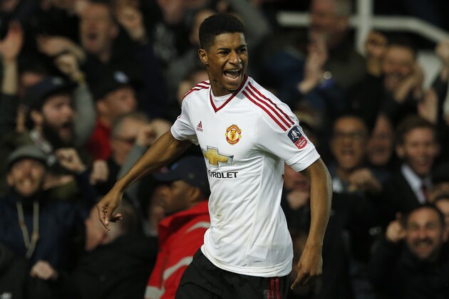 United’s Marcus Rashford celebrates after scoring his side's first goal during the English FA Cup quarterfinal replay soccer match between West Ham and Manchester United at Boleyn Ground stadium in London, Wednesday, April 13, 2016.(AP Photo/Alastair Grant)