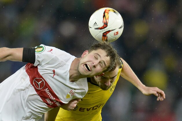 TOPSHOT - Stuttgart's Ukrainian forward Artem Kravets (L) and Dortmund's defender Marcel Schmelzer vie for the ball during the German Cup ( Pokal ) quarter final football match VfB Stuttgart v Borussia Dortmund on February 9, 2016 in Stuttgart. / AFP / Thomas Kienzle / RESTRICTIONS: ACCORDING TO DFB RULES IMAGE SEQUENCES TO SIMULATE VIDEO IS NOT ALLOWED DURING MATCH TIME. MOBILE (MMS) USE IS NOT ALLOWED DURING AND FOR FURTHER TWO HOURS AFTER THE MATCH.
== RESTRICTED TO EDITORIAL USE == 
FOR MORE INFORMATION CONTACT DFB DIRECTLY AT +49 69 67880
 /         (Photo credit should read THOMAS KIENZLE/AFP/Getty Images)