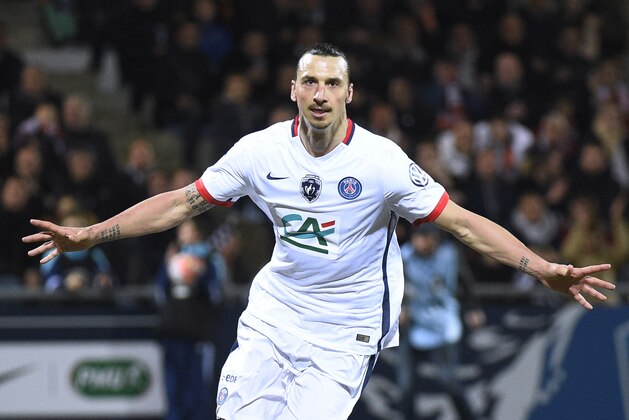 Paris Saint-Germain's Swedish forward Zlatan Ibrahimovic celebrates after scoring a goal during the French Cup semi-final football match between Lorient (FCL) and Paris Saint-Germain (PSG) at Moustoir stadium in Lorient, western France, on April 19, 2016. AFP PHOTO / DAMIEN MEYER / AFP / DAMIEN MEYER        (Photo credit should read DAMIEN MEYER/AFP/Getty Images)