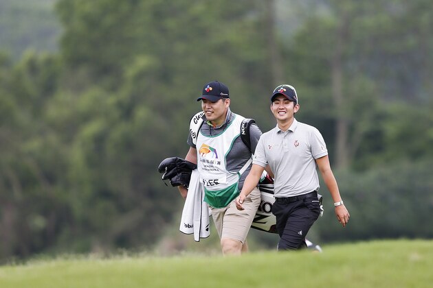 SHENZHEN, CHINA - APRIL 22: Soomin Lee of Korea walk with his caddy during the second round of the Shenzhen International at Genzon Golf Club on April 22, 2016 in Shenzhen, China. (Photo by Lintao Zhang/Getty Images) SHENZHEN, CHINA - APRIL 22: Soomin Lee of Korea walk with his caddy during the second round of the Shenzhen International at Genzon Golf Club on April 22, 2016 in Shenzhen, China. (Photo by Lintao Zhang/Getty Images)