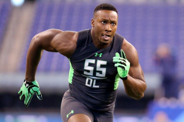 Eastern Kentucky defensive lineman Noah Spence performs a drill at the NFL football scouting combine Sunday, Feb. 28, 2016, in Indianapolis. (AP Photo/Gregory Payan)