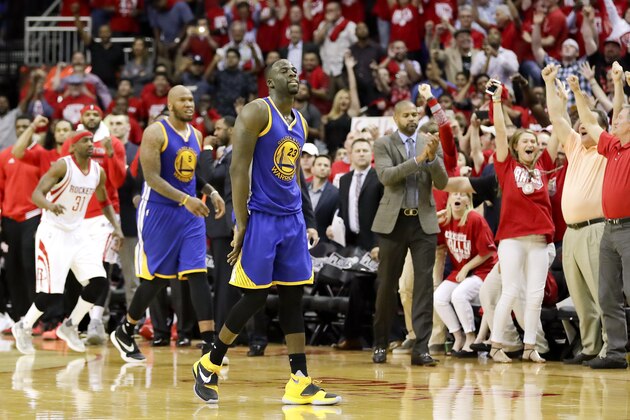 Golden State Warriors forward Draymond Green reacts after their 97-96 loss against the Houston Rockets in Game 3 of a first-round NBA basketball playoff series, Thursday, April 21, 2016, in Houston. (AP Photo/David J. Phillip)