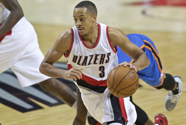 Portland Trail Blazers guard C.J. McCollum dribbles to the basket against the Oklahoma City Thunder during the second half of an NBA basketball game in Portland, Ore., Wednesday, April 6, 2016. (AP Photo/Craig Mitchelldyer)