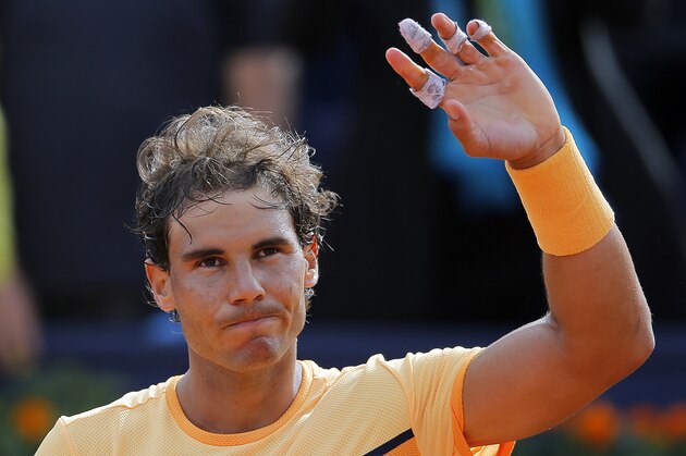 Rafael Nadal celebrates his victory over Marcel Granollers at the Barcelona open tennis tournament in Barcelona, Spain, Wednesday, April 20, 2016. (AP Photo/Manu Fernandez)