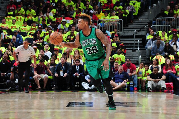 ATLANTA, GA - APRIL 16:  Marcus Smart #36 of the Boston Celtics handles the ball against the Atlanta Hawks in Game One of the Eastern Conference Quarterfinals during the 2016 NBA Playoffs on April 16, 2016 at Philips Arena in Atlanta, Georgia.  NOTE TO USER: User expressly acknowledges and agrees that, by downloading and/or using this Photograph, user is consenting to the terms and conditions of the Getty Images License Agreement. Mandatory Copyright Notice: Copyright 2016 NBAE (Photo by Scott Cunningham/NBAE via Getty Images)