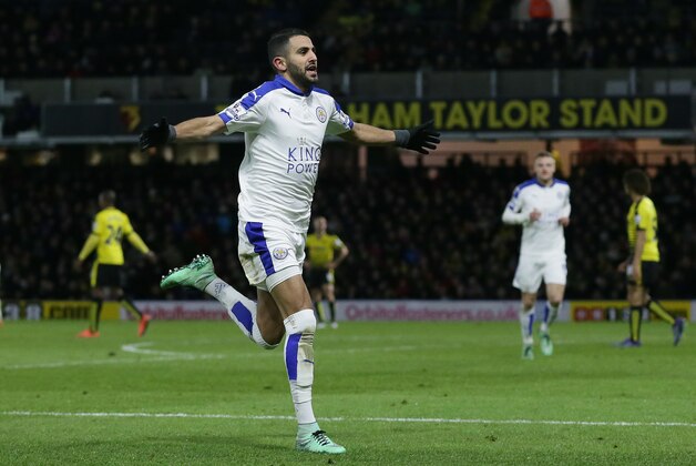Leicester’s Riyad Mahrez celebrates after scoring a goal during the English Premier League soccer match between Watford and Leicester City at the Vicarage Road stadium in London, Saturday, March 5, 2016. (AP Photo/Tim Ireland)