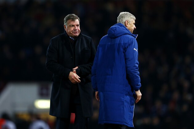 LONDON, ENGLAND - DECEMBER 28:  Arsene Wenger, manager of Arsenal walks past Sam Allardyce the West Ham manager during the Barclays Premier League match between West Ham United and Arsenal at Boleyn Ground on December 28, 2014 in London, England.  (Photo by Julian Finney/Getty Images)