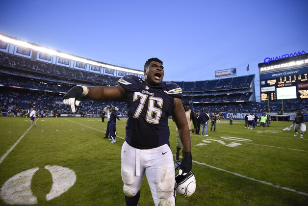 San Diego Chargers D.J. Fluker (76) leaves the field after their win against the Miami Dolphins in an NFL football game Sunday, Dec. 20, 2015, in San Diego. (AP Photo/Denis Poroy)