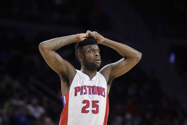 Detroit Pistons forward Reggie Bullock walks back to the bench during the second half of an NBA basketball game against the Washington Wizards, Friday, April 8, 2016, in Auburn Hills, Mich. (AP Photo/Carlos Osorio)