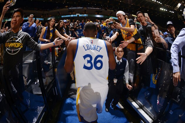 OAKLAND, CA - JANUARY 27: Kevon Looney #36 of the Golden State Warriors heads to the locker room after defeating the Dallas Mavericks on January 27, 2016 at Oracle Arena in Oakland, California. NOTE TO USER: User expressly acknowledges and agrees that, by downloading and or using this photograph, user is consenting to the terms and conditions of Getty Images License Agreement. Mandatory Copyright Notice: Copyright 2016 NBAE (Photo by Noah Graham/NBAE via Getty Images)