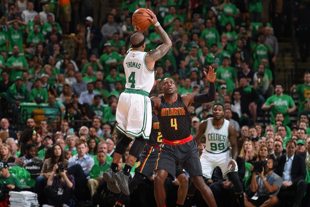 BOSTON, MA  - APRIL 22: Isaiah Thomas #4 of the Boston Celtics shoots against the Atlanta Hawks during Game Three of the Eastern Conference Quarterfinals during the 2016 NBA Playoffs on April 22, 2016 at TD Garden in Boston, Massachusetts. NOTE TO USER: User expressly acknowledges and agrees that, by downloading and or using this Photograph, user is consenting to the terms and conditions of the Getty Images License Agreement. Mandatory Copyright Notice: Copyright 2016 NBAE (Photo by Brian Babineau/NBAE via Getty Images)