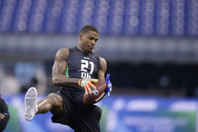 Clemson defensive back T J Green runs a drill at the NFL football scouting combine on Monday, Feb. 29, 2016, in Indianapolis. (AP Photo/Darron Cummings)