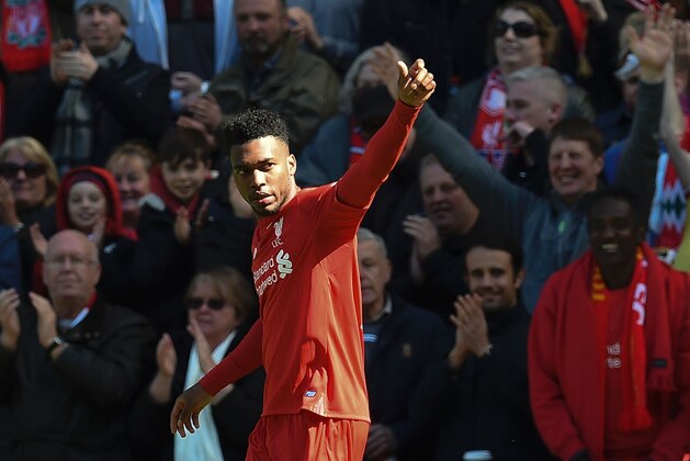 Liverpool's English striker Daniel Sturridge celerbates scoring the opening goal during the English Premier League football match between Liverpool and Newcastle United at Anfield in Liverpool, north west England on April 23, 2016. / AFP / PAUL ELLIS / RESTRICTED TO EDITORIAL USE. No use with unauthorized audio, video, data, fixture lists, club/league logos or 'live' services. Online in-match use limited to 75 images, no video emulation. No use in betting, games or single club/league/player publications.  /         (Photo credit should read PAUL ELLIS/AFP/Getty Images)