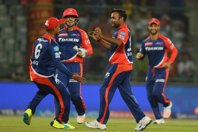 Delhi Daredevils bowler Amit Mishra (R) celebrates after he dismissed Kings XI Punjab batsman Manan Vohra during the 2016 Indian Premier League (IPL) Twenty20 cricket match between Delhi Daredevils and Kings XI Punjab at The Feroz Shah Kotla Cricket Stadium in New Delhi on April 15, 2016. ------IMAGE RESTRICTED TO EDITORIAL USE - STRICTLY NO COMMERCIAL USE- / AFP / SAJJAD HUSSAIN        (Photo credit should read SAJJAD HUSSAIN/AFP/Getty Images)
