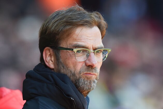 Liverpool's German manager Jurgen Klopp waits for kick off of the English Premier League football match between Liverpool and Newcastle United at Anfield in Liverpool, north west England on April 23, 2016. / AFP / PAUL ELLIS / RESTRICTED TO EDITORIAL USE. No use with unauthorized audio, video, data, fixture lists, club/league logos or 'live' services. Online in-match use limited to 75 images, no video emulation. No use in betting, games or single club/league/player publications.  /         (Photo credit should read PAUL ELLIS/AFP/Getty Images)