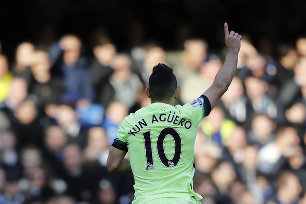 Manchester City's Sergio Aguero celebrates after he scored the opening goal of the game during the English Premier League soccer match between Chelsea and Manchester City at Stamford Bridge stadium in London, Saturday, April 16,  2016. City went on to win the match 3-0, with Aguero scoring all three goals. (AP Photo/Frank Augstein)